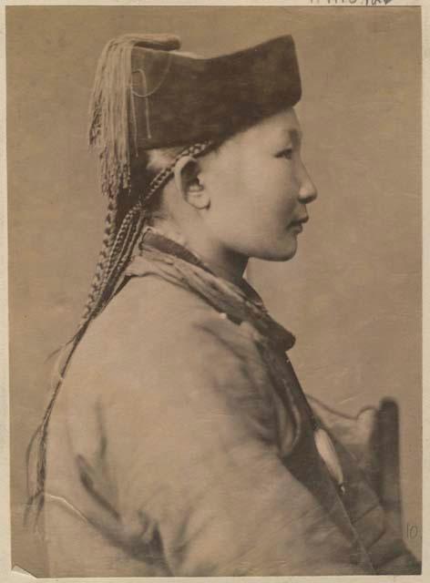 Portrait of a woman sitting, profile