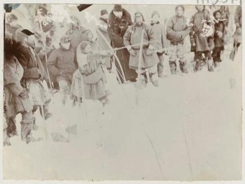 Group practicing archery