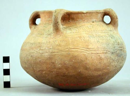 Plain red incised pottery jar - 4 handles