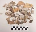 36 frags quartz & limestone; 67 fragments stone; 1 fragment bone-like material