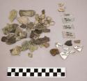 Chipping waste, quartz, bone, pottery, 2 glass, 2 glass fragments, pottery sherd