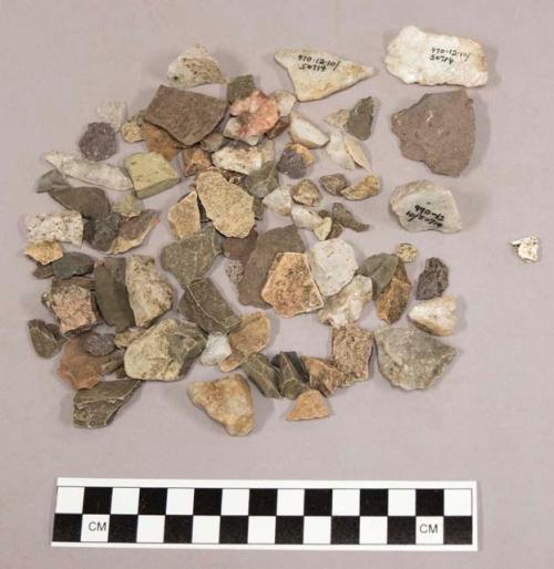 Approx. 111 stone chips; 48 pieces quartz & quartz-like material; 1 bone fragmen