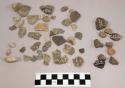 Approx. 132 stone chips; 11 pieces unglazed pottery; 25 pieces quartz & quartz-l