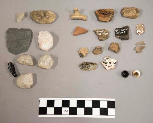 Chipping waste, quartz, bone, buttons, pottery, pottery sherds