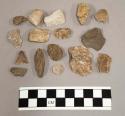 44 chips stone; 52 chips quartz & limestone; fragment mica (?)