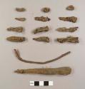 Oxidized nails and nail fragments, including one possible wire fragment