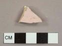 Pink-glazed tile fragment