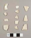 Creamware sherds, including four plate rim sherds from different vessels
