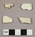 Creamware fragments, including one possible rim sherd to a bowl