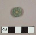 Copper alloy button with central hole and missing shank