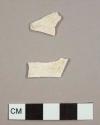 Creamware sherds, one with no glaze remaining