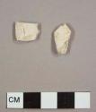 White ball clay/Kaolin pipe bowl fragments with maker's marks, one with "T D" and one with "D", possibly from the same manufactuer