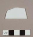 Opaque white plastic bowl rim fragment