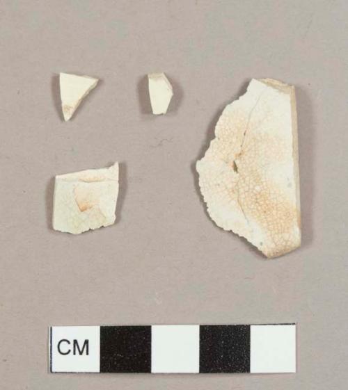 Miscellaneous refined white earthenware sherds, including one pearlware sherd, two creamware sherds, and whiteware sherd