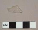 Colorless plastic rim fragment, possibly from cup