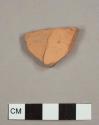 Unglazed red earthenware sherd