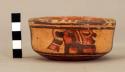 Ceramic bowl, polych. ext., black on orange, dimple base, animal motif, mende
