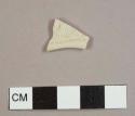 White salt-glazed stoneware plate rim sherd with "barley" pattern