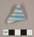 European or American porcelain sherd with plain interior and blue striped exterior