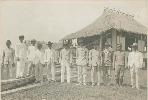 Constabulary Inspector Basa, school teacher Brown, and the municipal officials of Mamburao