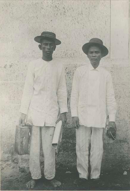 Two Tagalog men who work as house painters