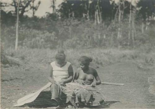 Tagbanua women weaving a mat