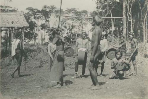 Tagbanua people making music and dancing