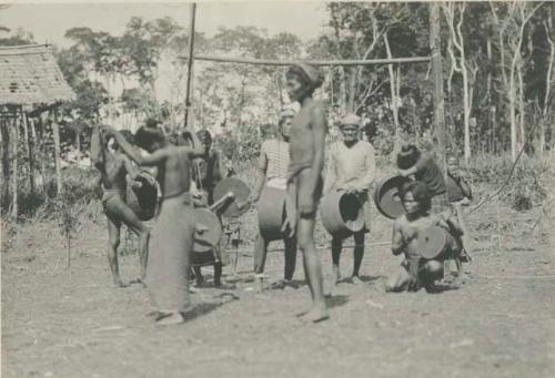 Tagbanua people making music and dancing