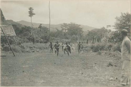 Tagbanua men running in foot-race