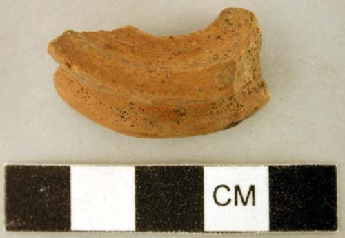 Earthenware ear spool fragment