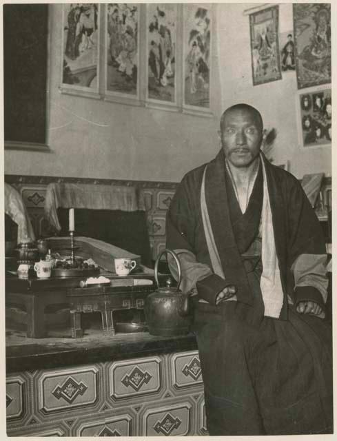 Chi Lama preparing tea in his home