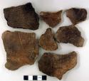 Ceramic, earthenware body sherds, incised and cord-impressed, one is mended to two sherds labeled 34436.1