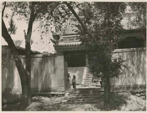 Temple entrance with schoolchildren in doorway