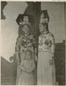 Two Manchu ladies and small boy all in ornate clothing