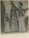 Wang Yeh Fu lady, Manchu lady, and small boy outside