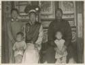 A Manchu family of two adults and three children