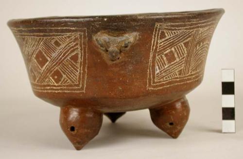 Large maroon incised ware tripod bowl