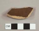 Lustrous-glazed stoneware plate base sherd