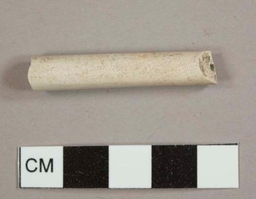 White ball clay/Kaolin pipe stem fragment with a 4/64th inch bore hole