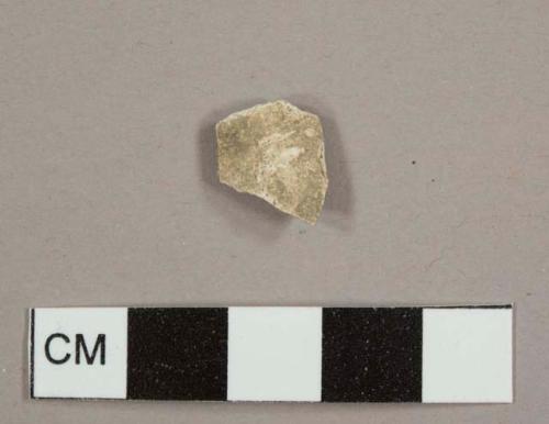 White ball clay/Kaolin pipe bowl fragment with ash/residue lining on interior