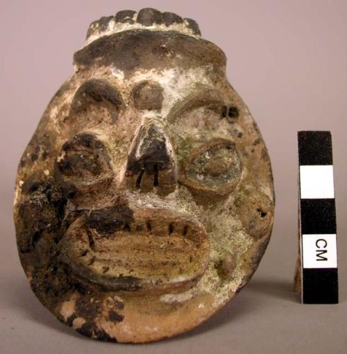 Pottery head from incense burner