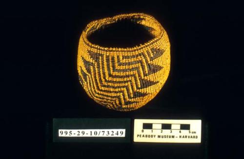 Twined globular basket; geometric motifs