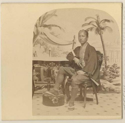 Studio portrait of a man sitting, Japanese delegation visit to New York