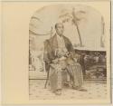 Studio portrait of a man sitting, Japanese delegation visit to New York