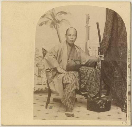 Studio portrait of a man sitting, Japanese delegation visit to New York