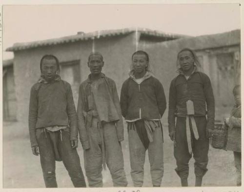 Portrait of four natives of Wang Yeh Fu outside