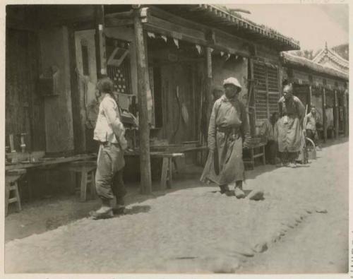 Men on a main shopping street