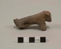 Fragment of animal effigy, including trunk, head & front two legs. plain ware. 8