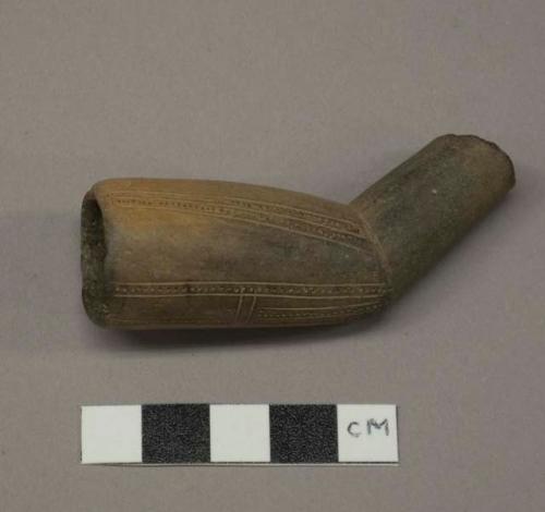 Ceramic, earthenware, elbow pipe bowl and stem fragment with incised decoration