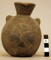 Pottery jar, canteen shape, stamped